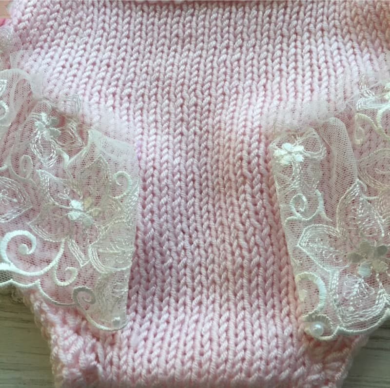 Hand knit pink romper with ivory lace, hat and shoes for baby girl.
