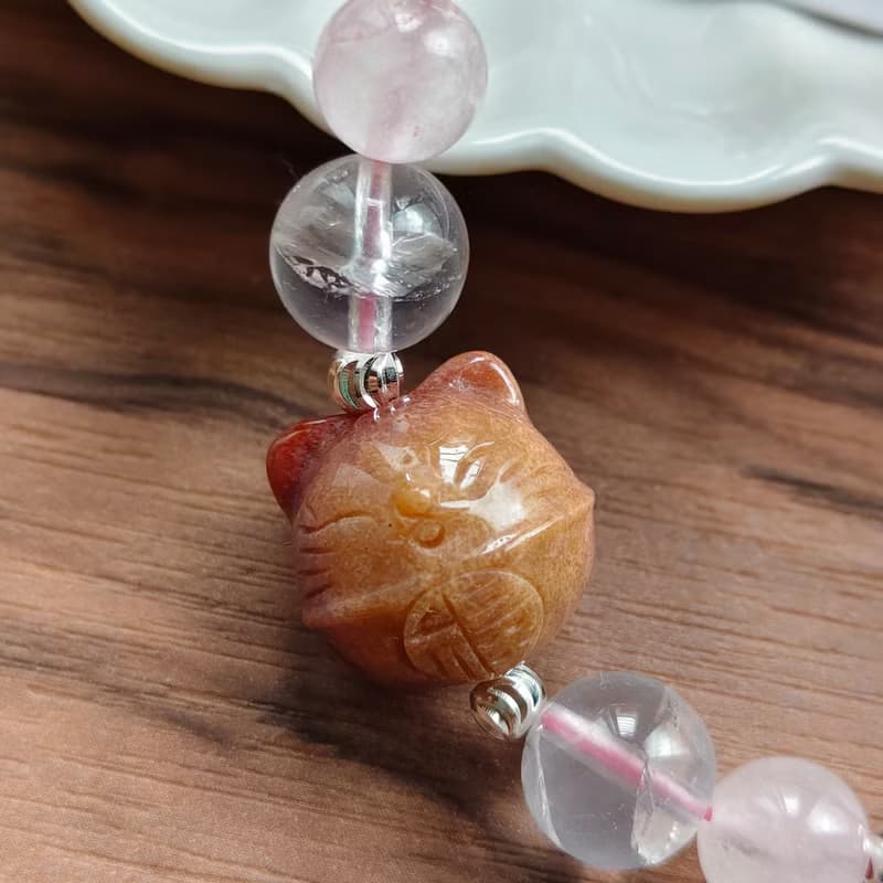 【珊瑚玉叮噹貓x粉水晶x粉阿塞編織手鏈 】好人緣