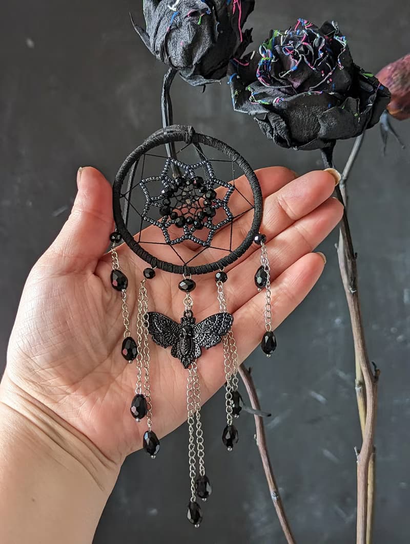 Small Gothic black dream catcher with moth skull and black sparkling crystals