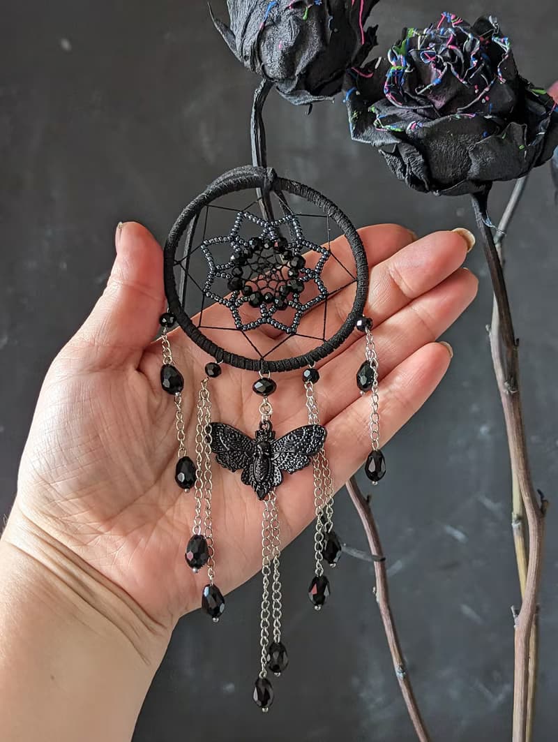 Small Gothic black dream catcher with moth skull and black sparkling crystals