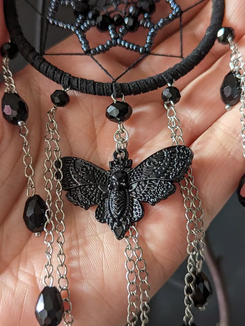 Small Gothic black dream catcher with moth skull and black sparkling crystals