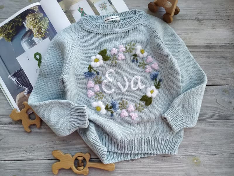 Custom knitted cotton, merino sweater with embroidered flowers  for baby, girl