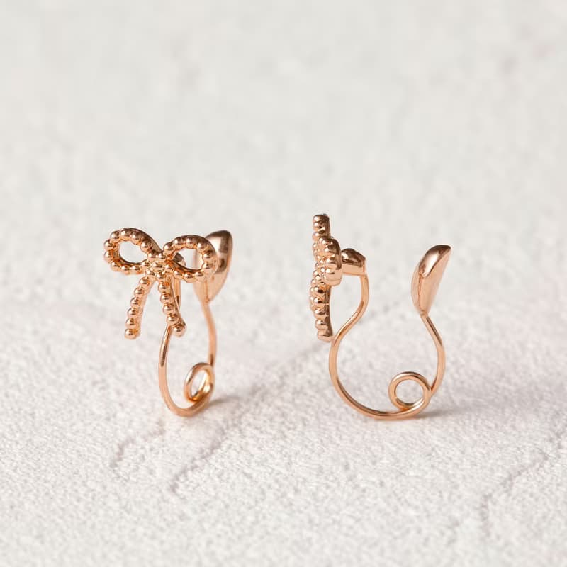 petit ribbon loop-fit earring PG　ループフィットイヤリング　ミニリボン 　ピンクゴールド
