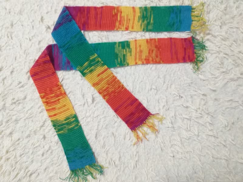 Rainbow hand knitted ankle scarf in wool