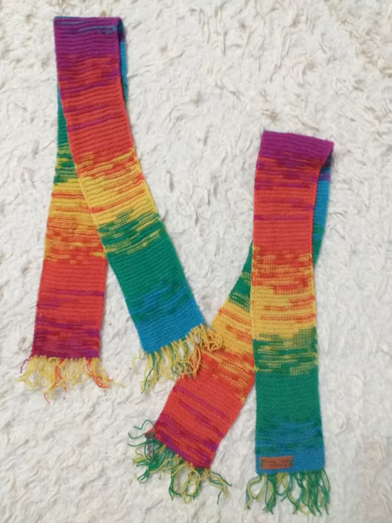 Rainbow hand knitted ankle scarf in wool