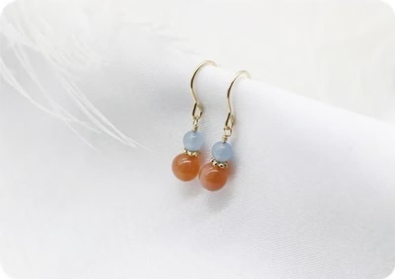 オリジナル　幸福に導くアクアマリンとサンストーンの双子ちゃんピアス　イヤリング可　3月誕生石