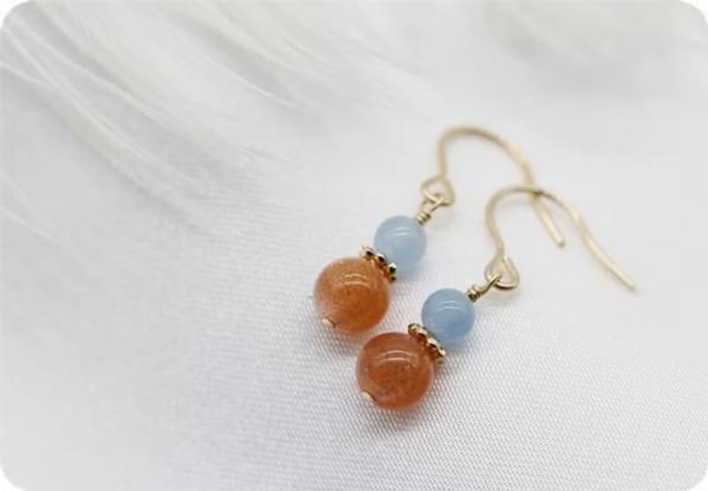 オリジナル　幸福に導くアクアマリンとサンストーンの双子ちゃんピアス　イヤリング可　3月誕生石