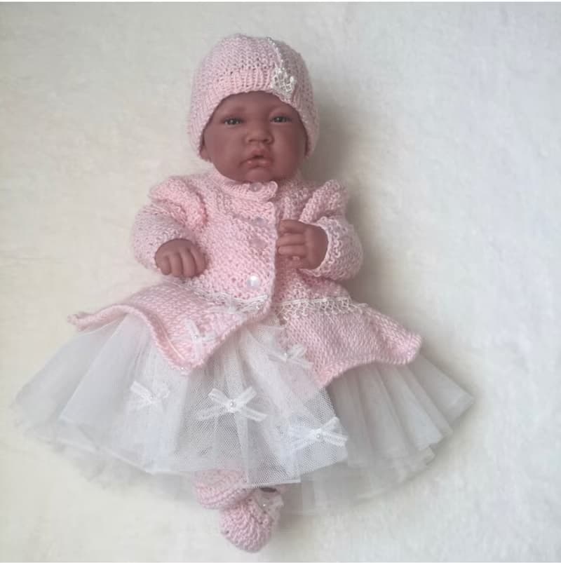 Hand knit pink outfit for baby girl. Dress with pearls and lace, hat, booties.