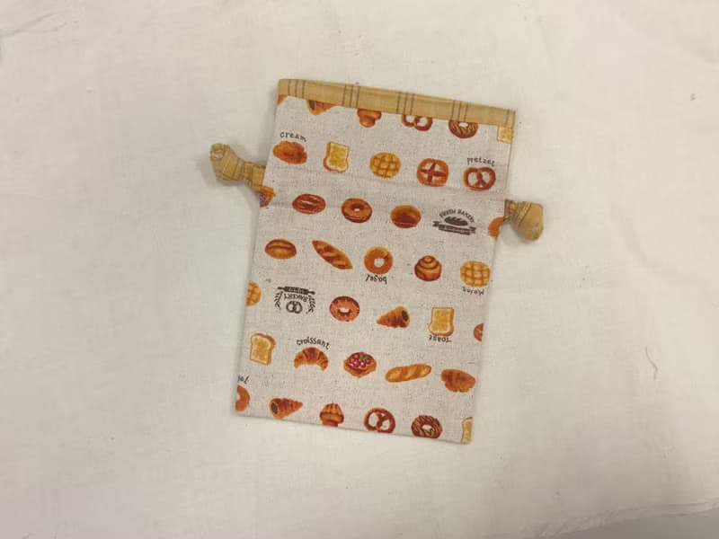 雙面小巧束口袋-小麵包搭配黃色格子先染布
