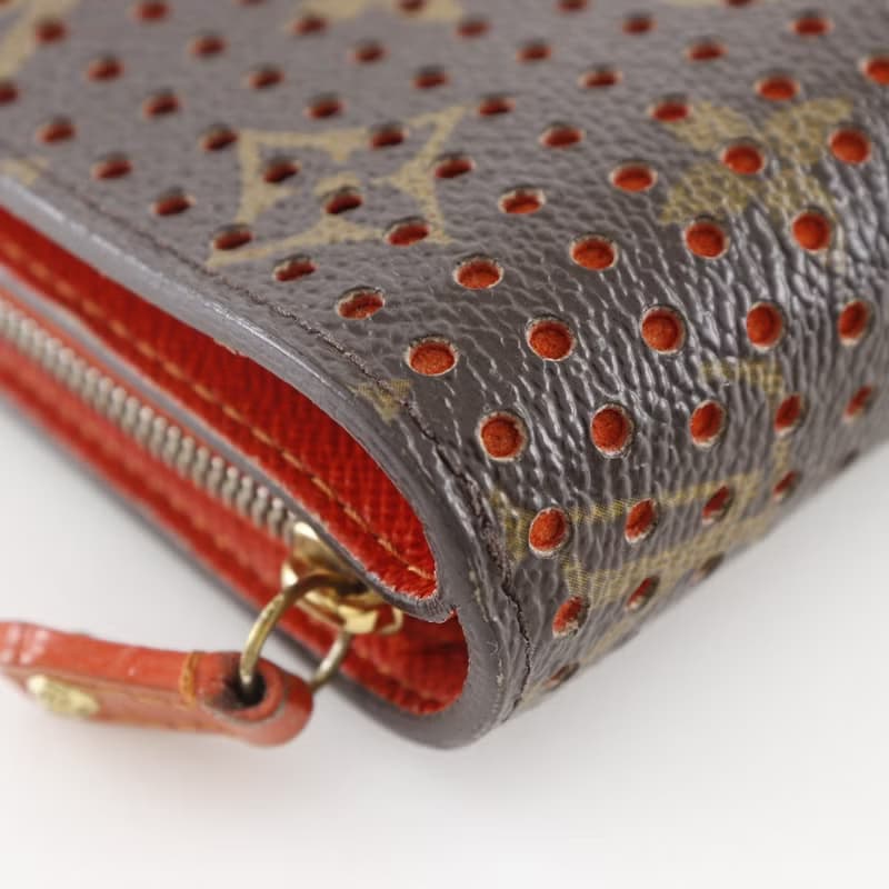 【日本直送】 LOUIS VUITTON コンパクトジップ 二つ折り財布 パンチング M95189 モノグラムペルフォ オレンジ MI0046 【中古】