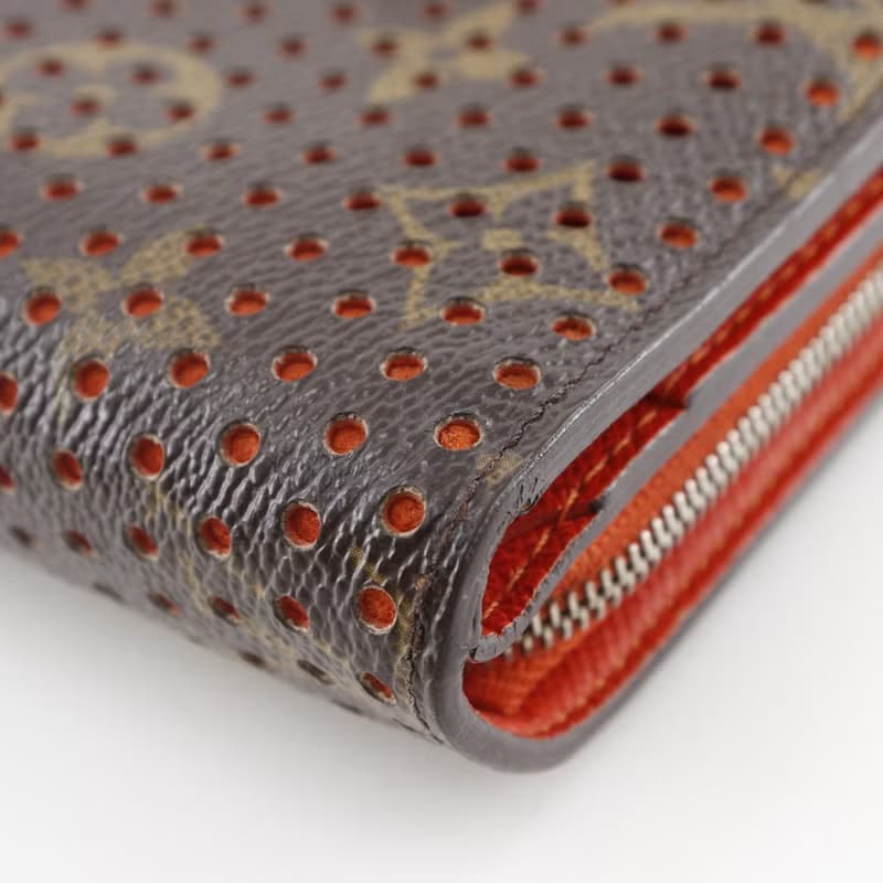 【日本直送】 LOUIS VUITTON コンパクトジップ 二つ折り財布 パンチング M95189 モノグラムペルフォ オレンジ MI0046 【中古】