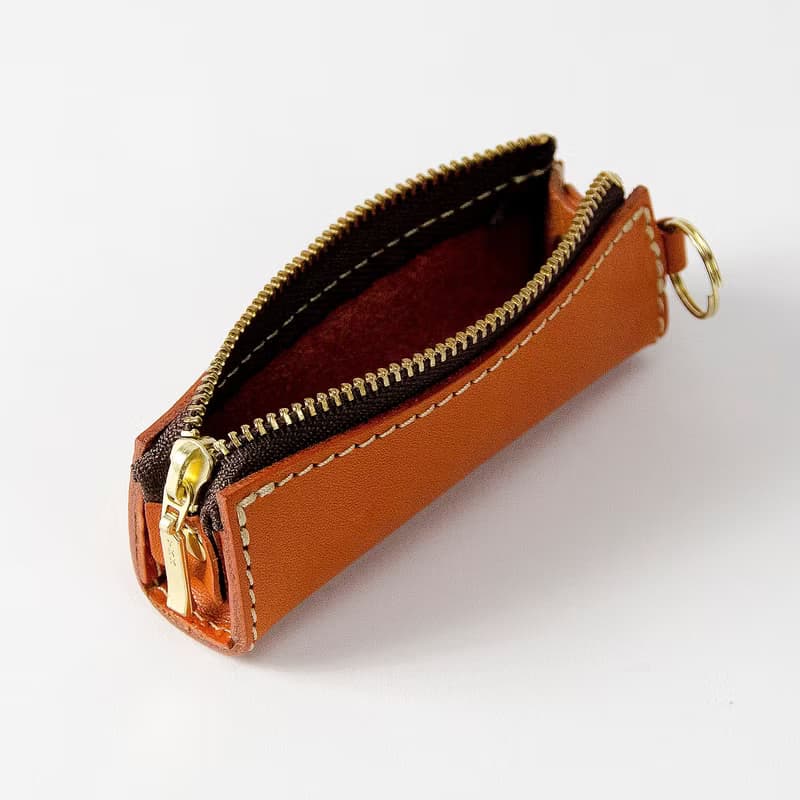 Kagen TAKARA 圓柱形零錢包 巧克力色