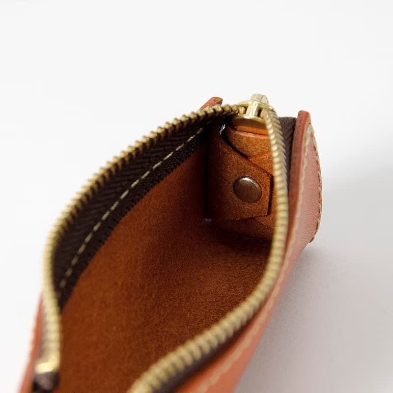 Kagen TAKARA 圓柱形零錢包 巧克力色