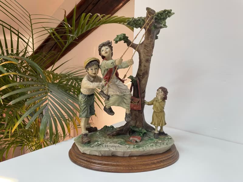 Capodimonte – Large sculpture of children on a swing
