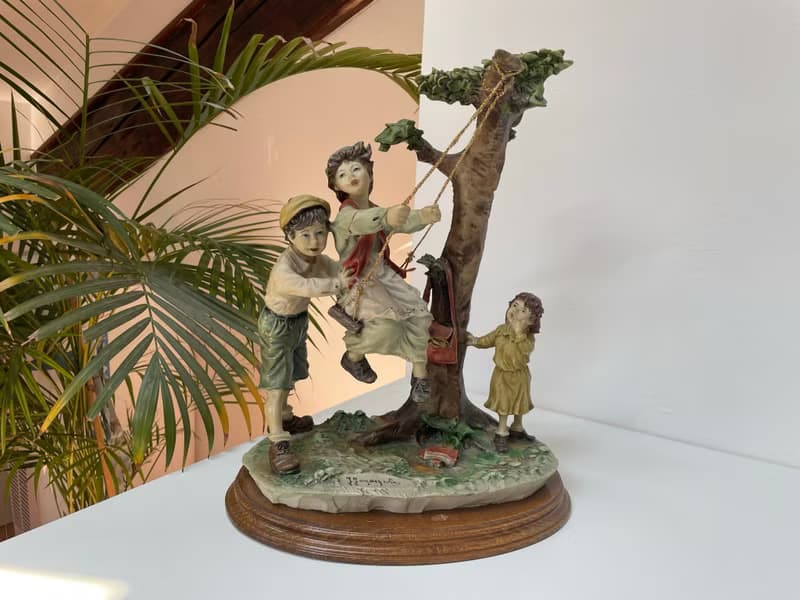Capodimonte – Large sculpture of children on a swing
