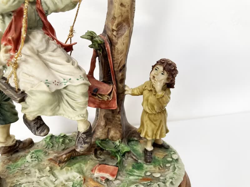 Capodimonte – Large sculpture of children on a swing
