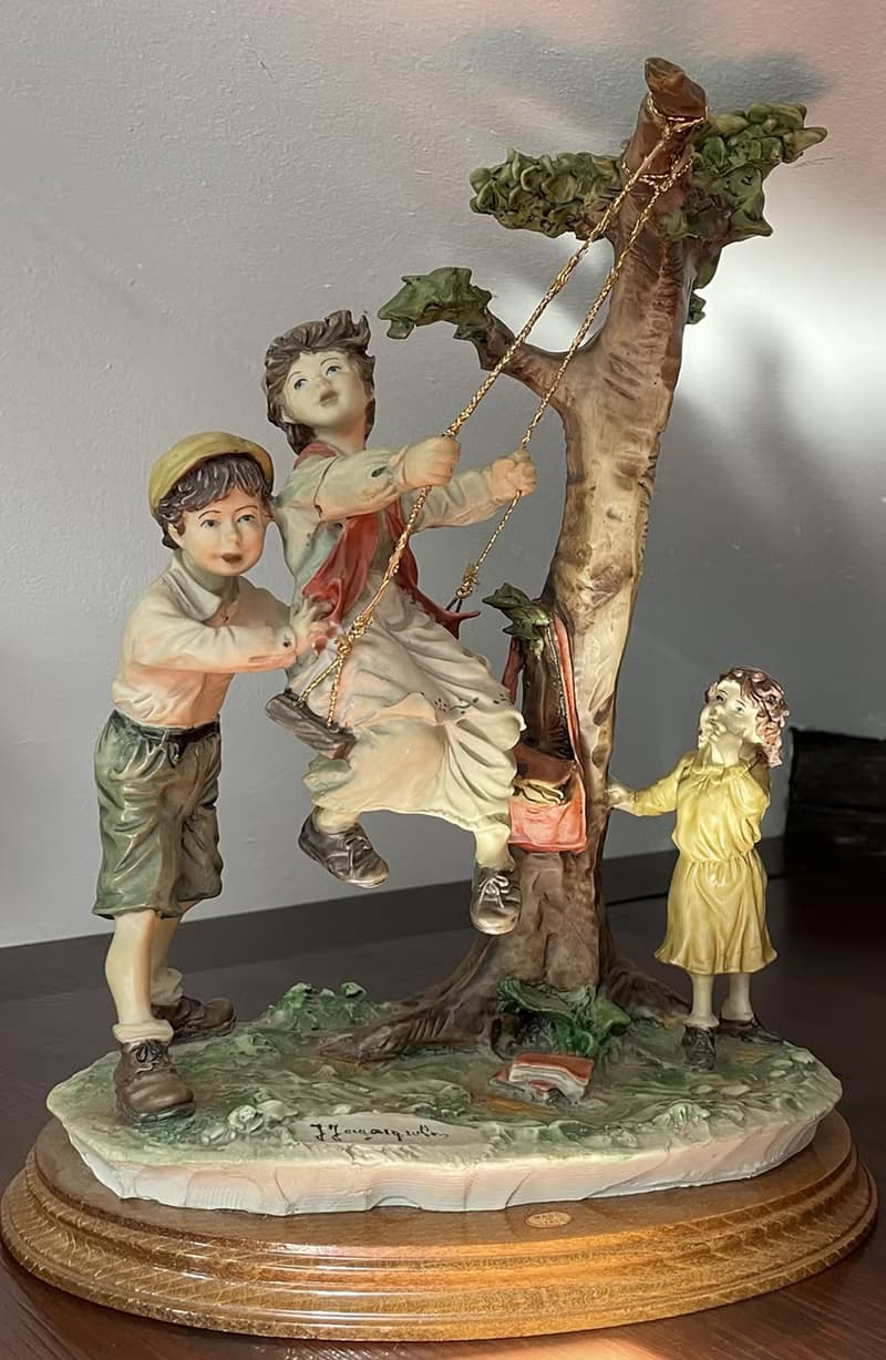 Capodimonte – Large sculpture of children on a swing