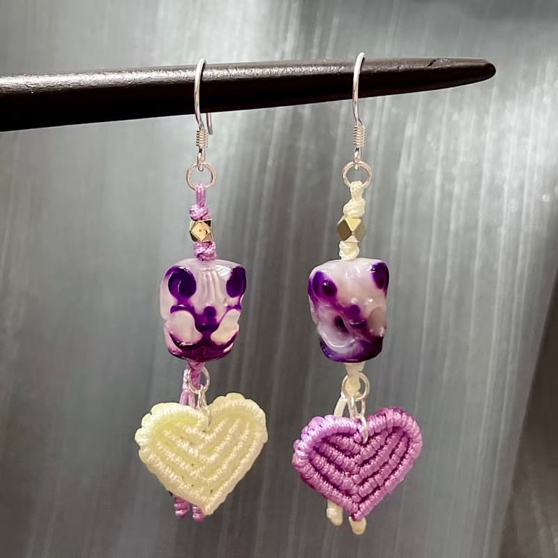 白紫雙面雕刻夜王屍陀林主心形編織個性款S925銀耳墜