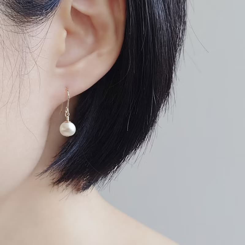 限量 - 中橢圓淡水珍珠 7.5mm 14Kgf 包金耳環 | 可改耳夾