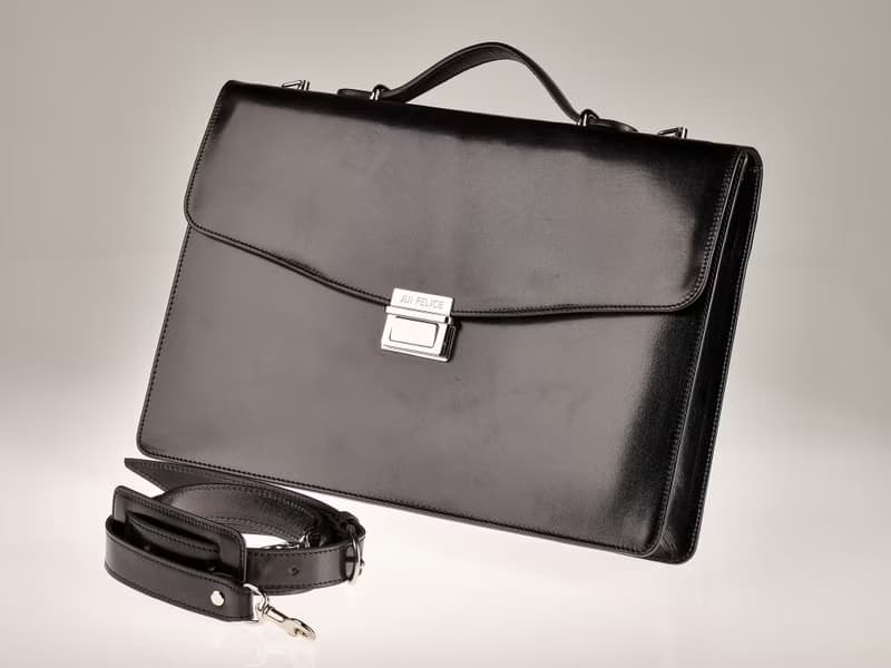 Black vegetable-tanned leather briefcase / nickel finish brass accessories