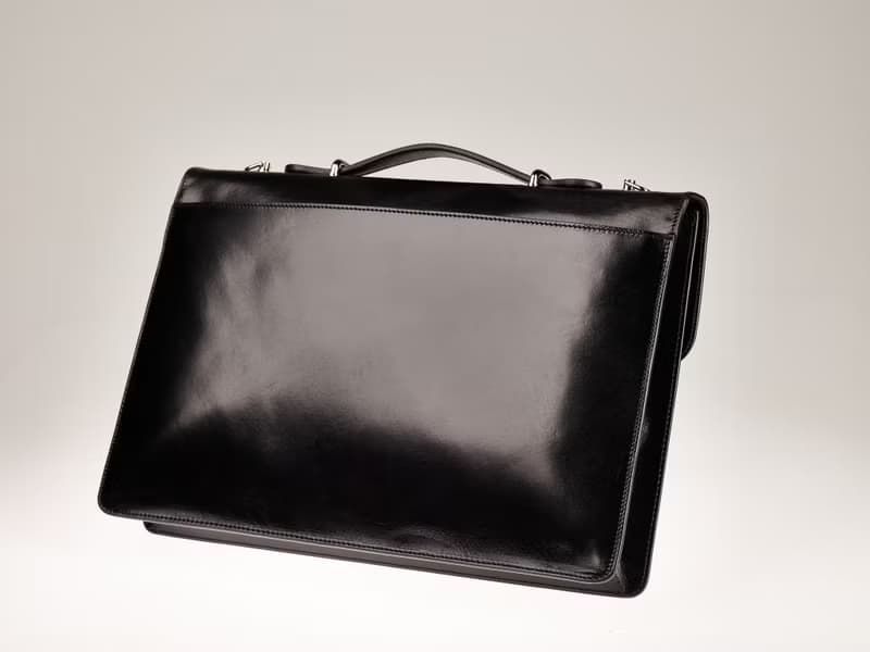 Black vegetable-tanned leather briefcase / nickel finish brass accessories