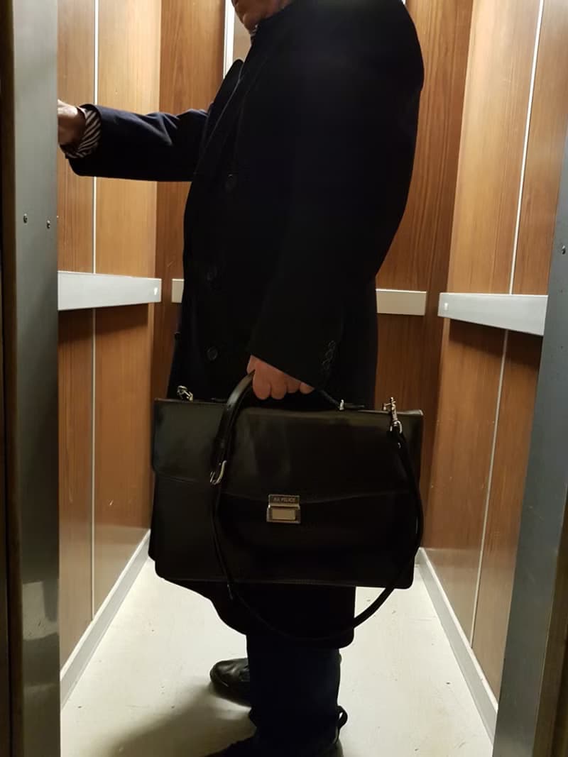 Black vegetable-tanned leather briefcase / nickel finish brass accessories