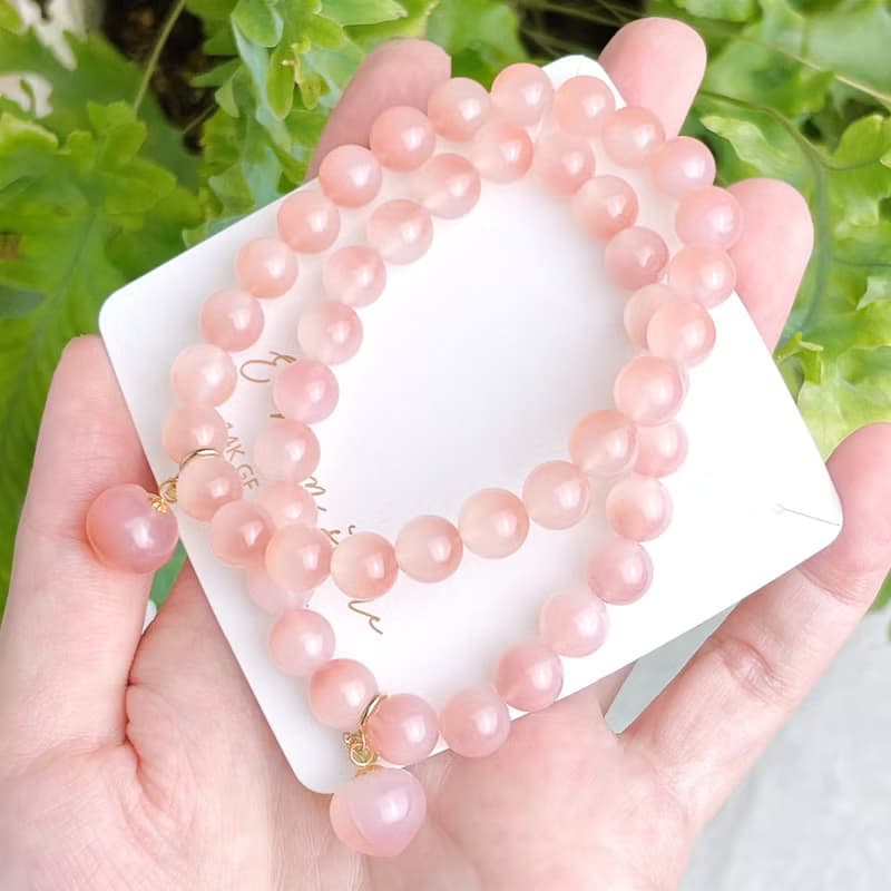 聚寶半盆 蜜桃果汁鹽源瑪瑙彈性手鍊