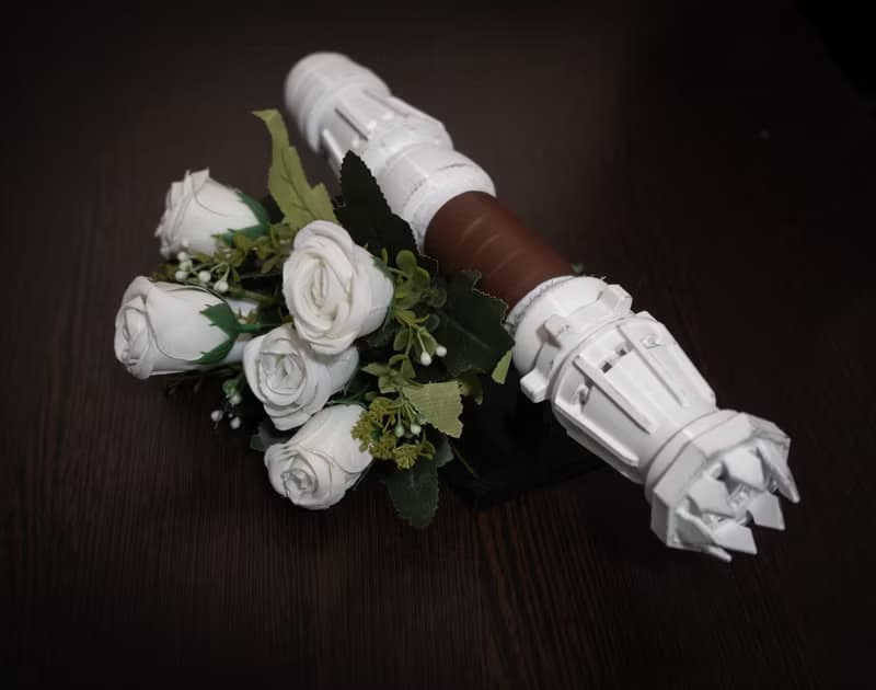 White wedding bouquet holder inspired by Rey's lightsaber hilt