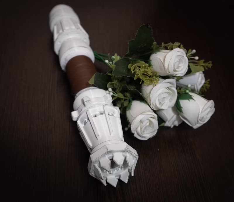 White wedding bouquet holder inspired by Rey's lightsaber hilt