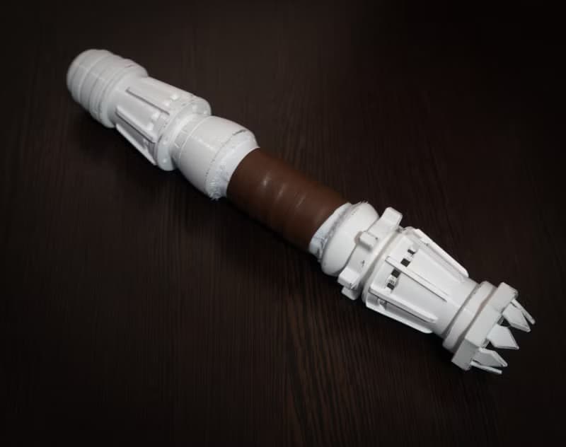 White wedding bouquet holder inspired by Rey's lightsaber hilt