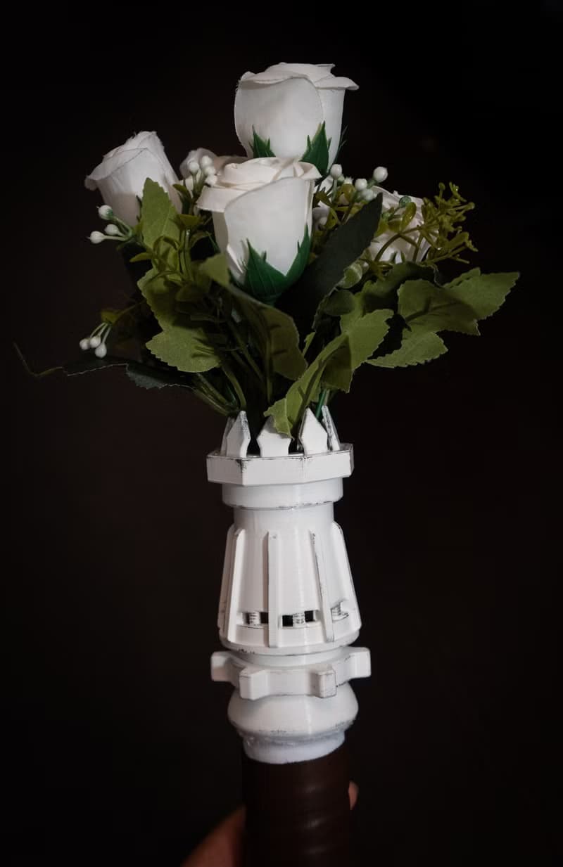White wedding bouquet holder inspired by Rey's lightsaber hilt