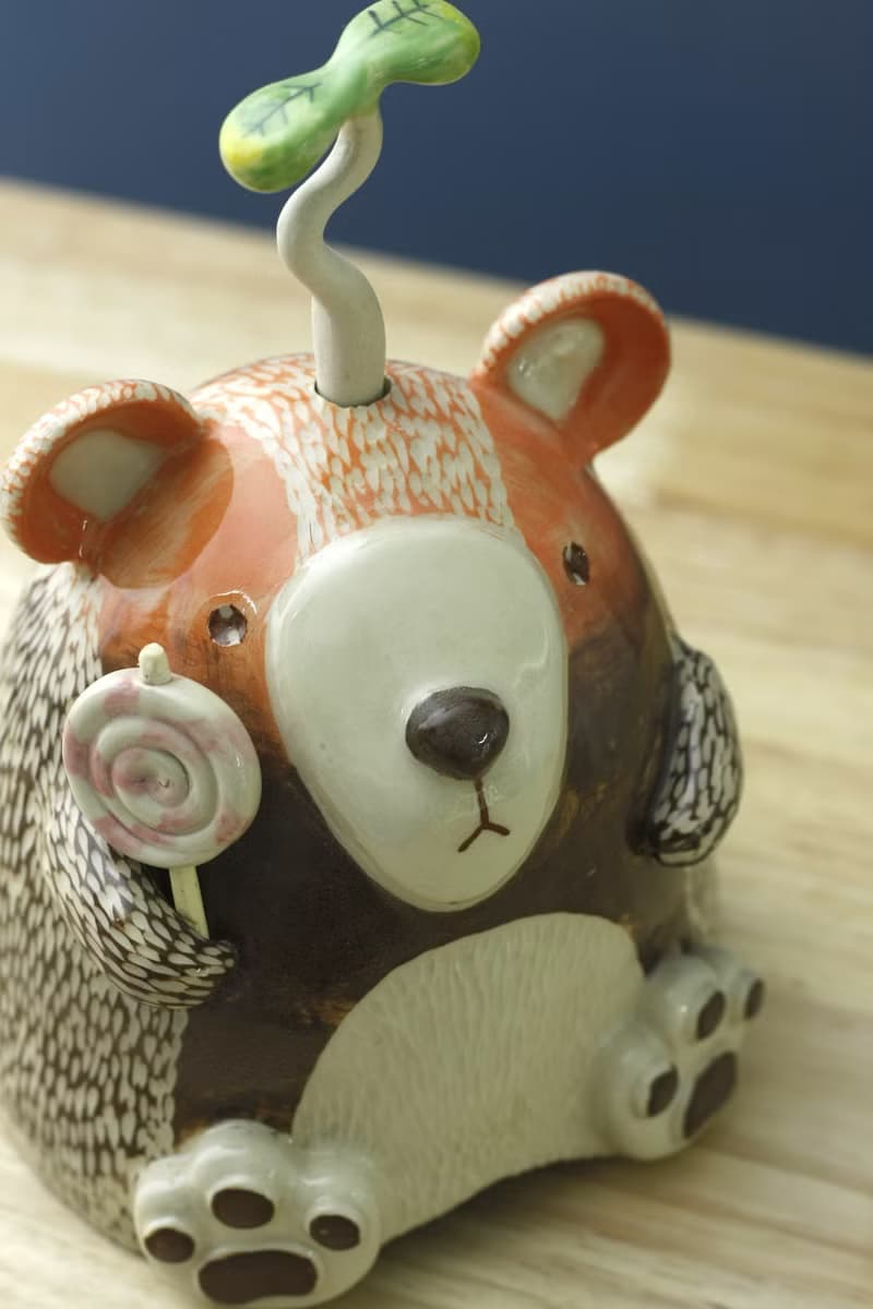 little bear with his lollipop