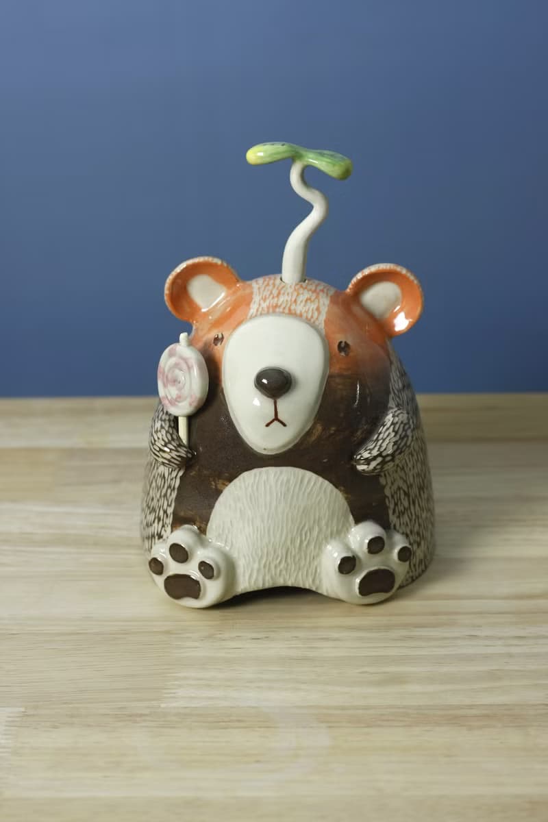 little bear with his lollipop