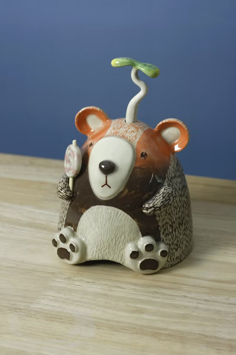 little bear with his lollipop