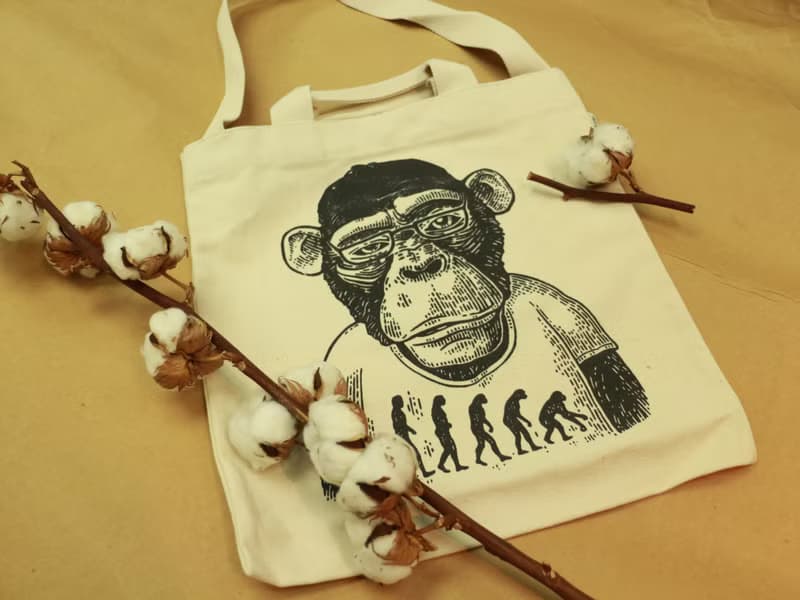 原色手挽側孭兩用帆布袋 猿人