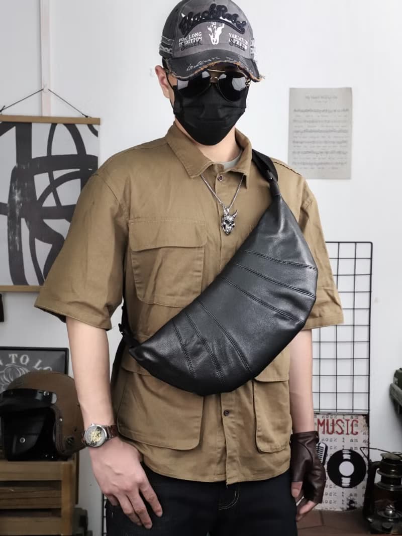 真皮男士斜跨包牛角包 頭層牛皮單肩包 復古機車背包胸包