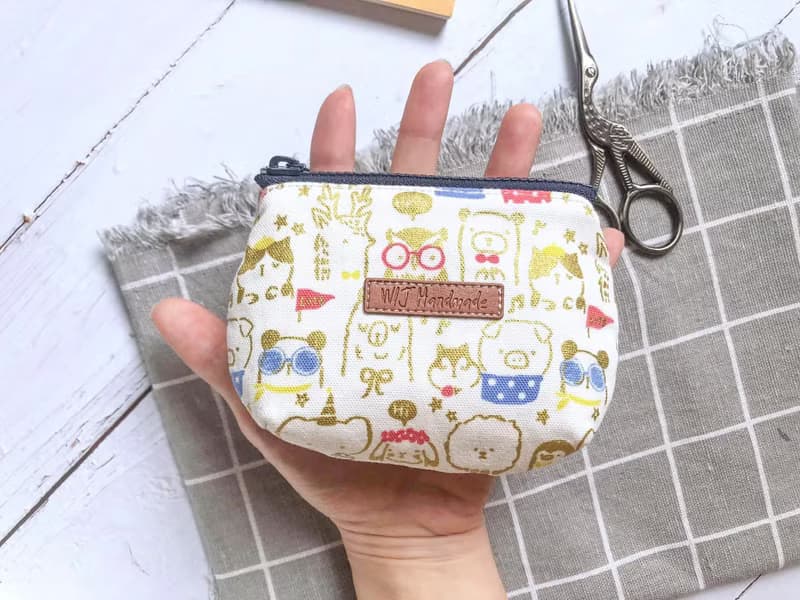 手作三層零錢包。燙金小動物