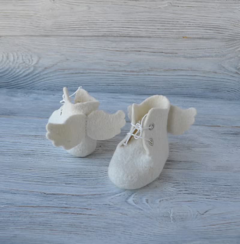Felted wool white baby booties with angel wings Newborn shoes Christening gift