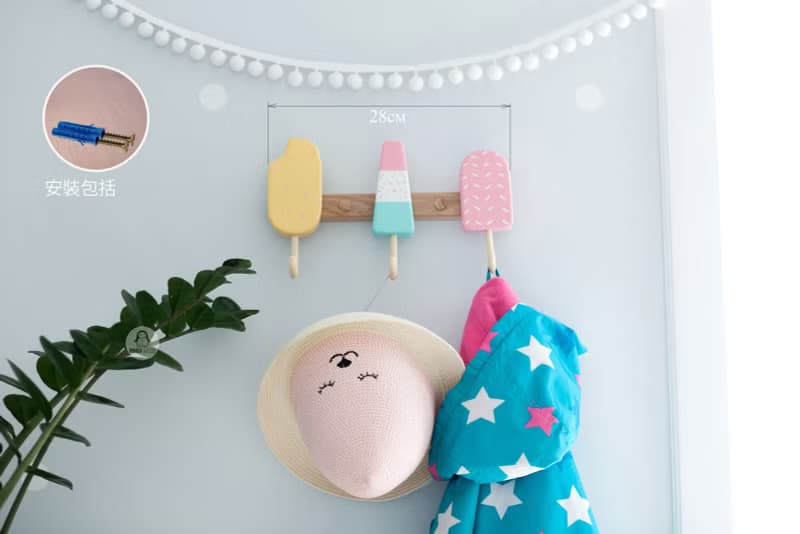 Clothes and towel hanger for nursery with wooden ice cream hooks