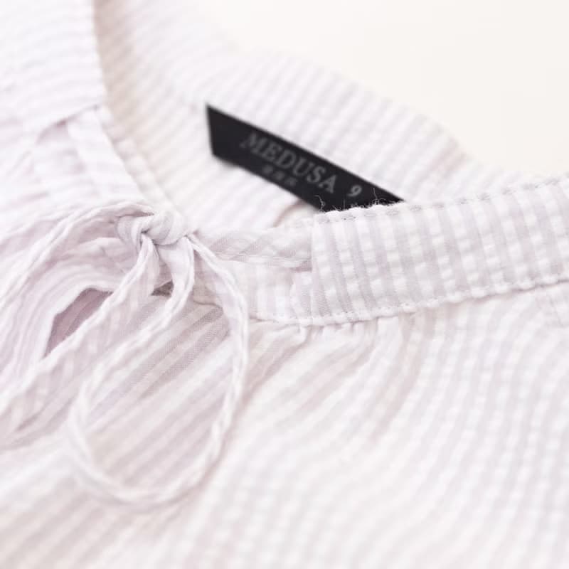 【MEDUSA】小立領綁結壓紋傘襬上衣(M-XL) | 女休閒上衣 短袖上衣