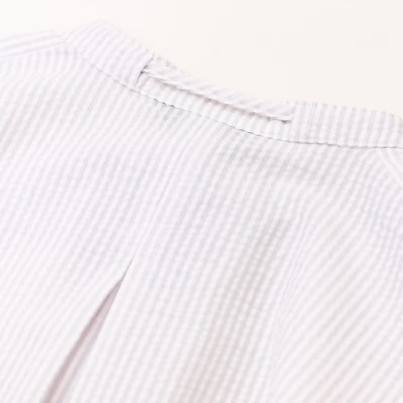 【MEDUSA】小立領綁結壓紋傘襬上衣(M-XL) | 女休閒上衣 短袖上衣