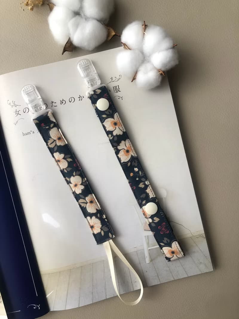【奶嘴鏈】-蝴蝶花 純棉布 手作 玩具鏈 固齒器鏈 粉黑粉黃