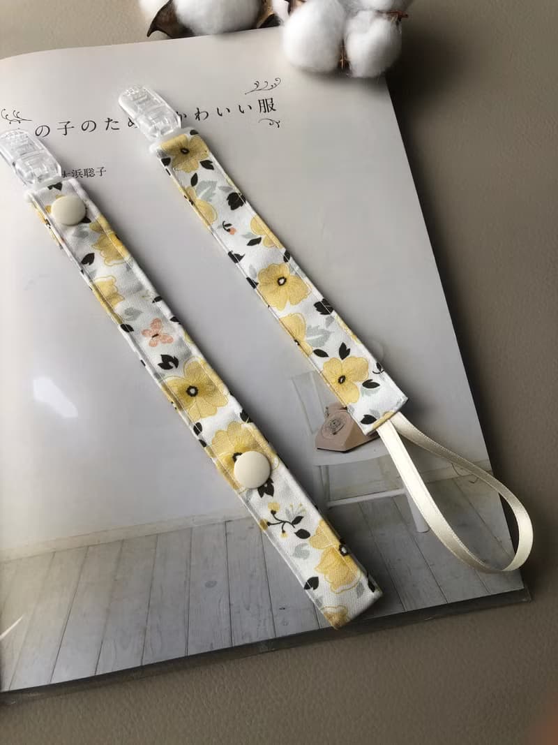 【奶嘴鏈】-蝴蝶花 純棉布 手作 玩具鏈 固齒器鏈 粉黑粉黃