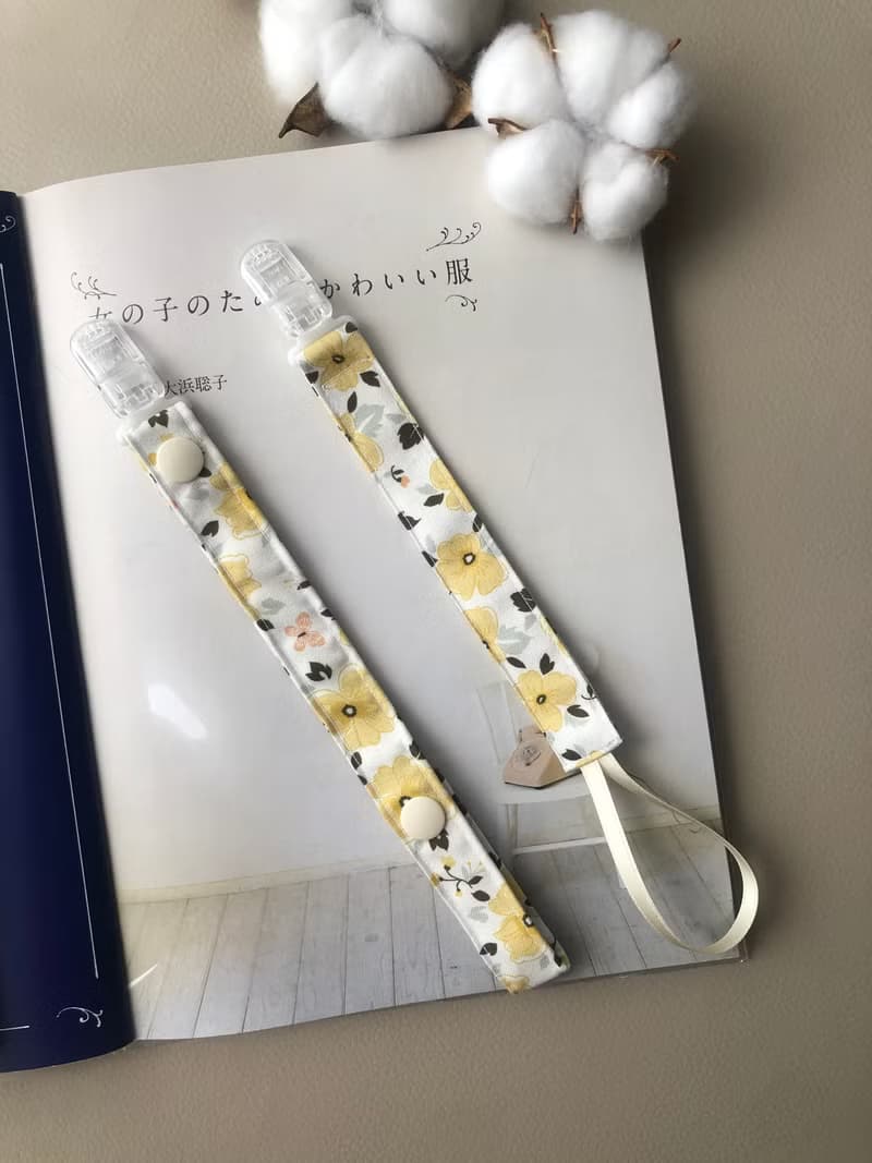 【奶嘴鏈】-蝴蝶花 純棉布 手作 玩具鏈 固齒器鏈 粉黑粉黃