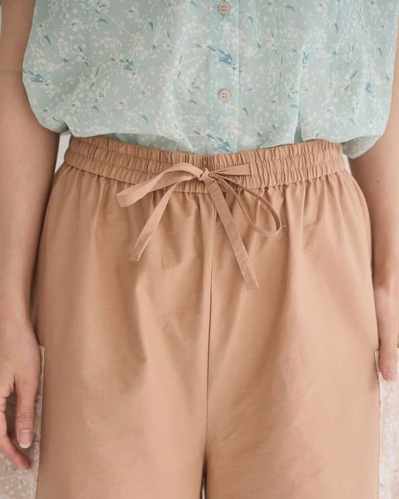 口袋寬褲/飛櫻/溫柔奶茶/花束