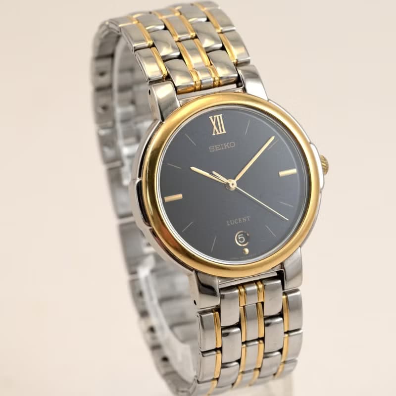 SEIKO LUCENT 7N22-6B20 ユニセックス 1984年 ダークブルーダイヤル デイト付 クォーツ ゴールド×シルバーコンビブレス  手錶 古董錶