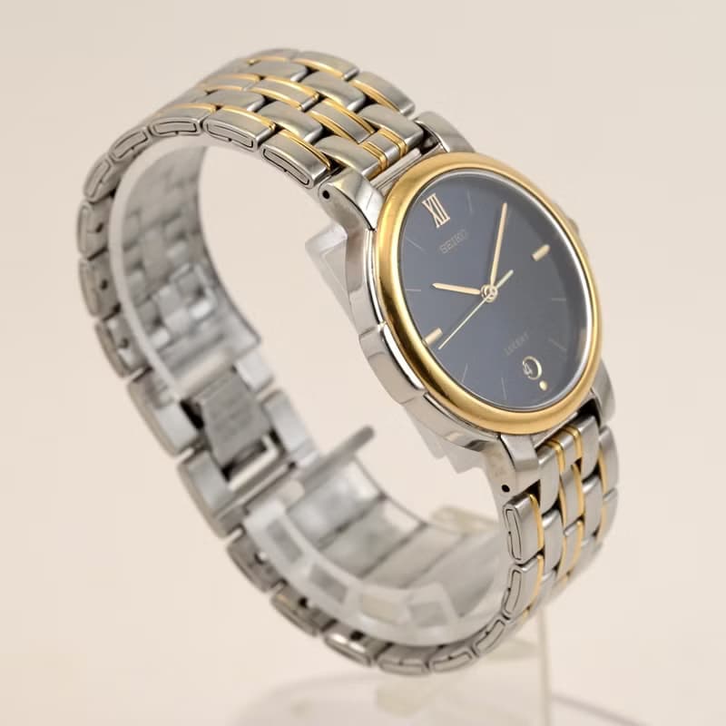 SEIKO LUCENT 7N22-6B20 ユニセックス 1984年 ダークブルーダイヤル デイト付 クォーツ ゴールド×シルバーコンビブレス  手錶 古董錶