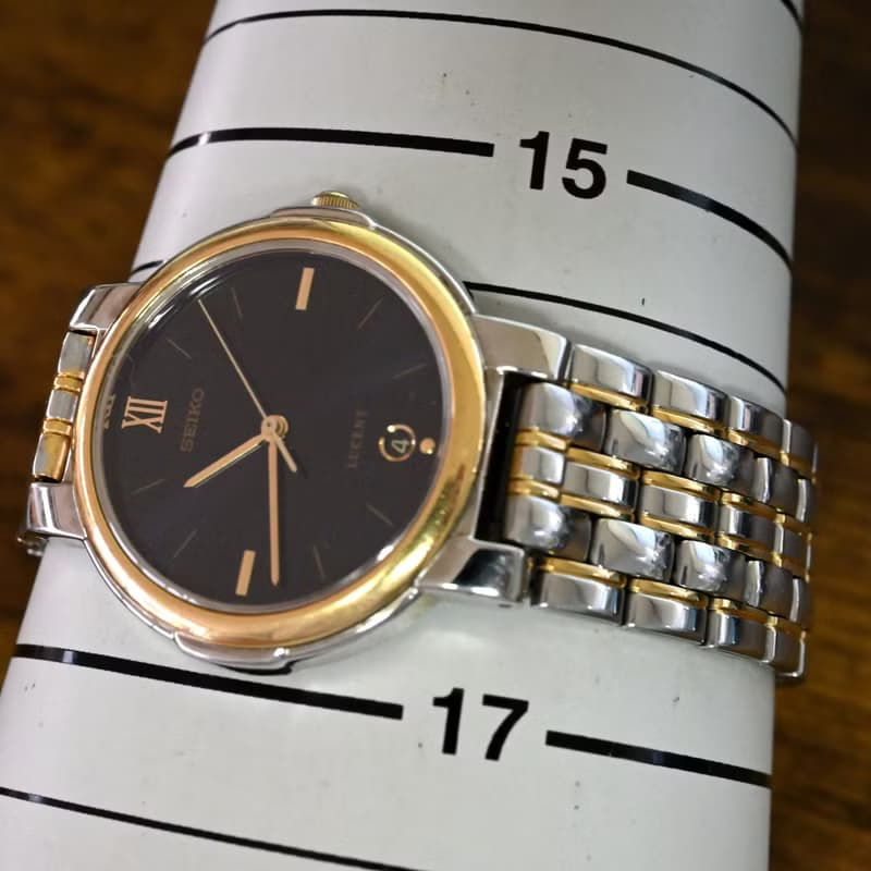 SEIKO LUCENT 7N22-6B20 ユニセックス 1984年 ダークブルーダイヤル デイト付 クォーツ ゴールド×シルバーコンビブレス  手錶 古董錶