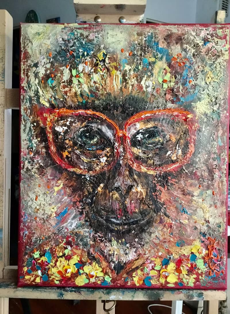 Colourful monkey in glasses
