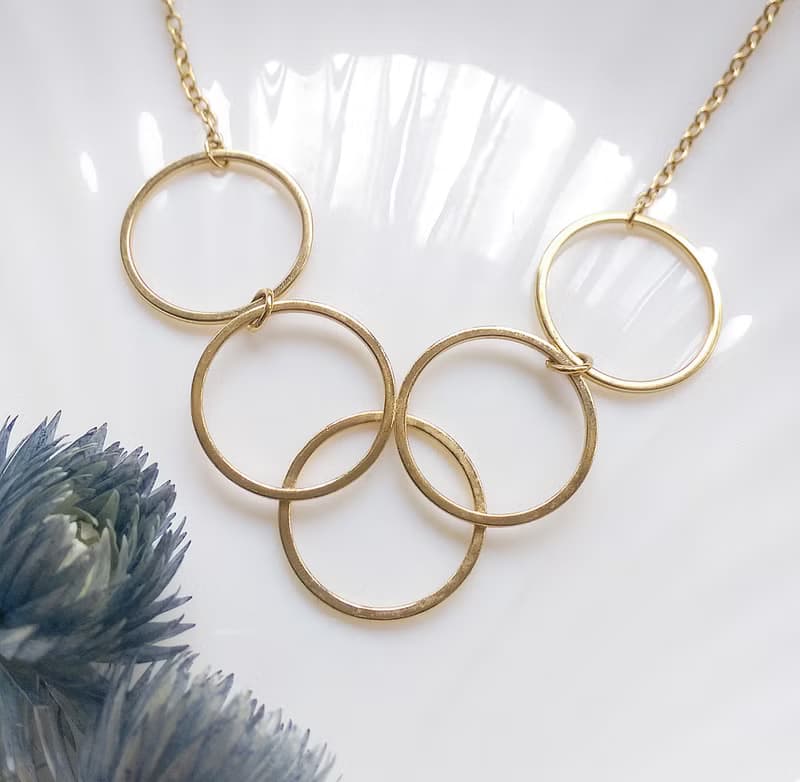 【西洋古董飾品 】AVON  1977年Gilded Circles 五環圈圈 項鍊